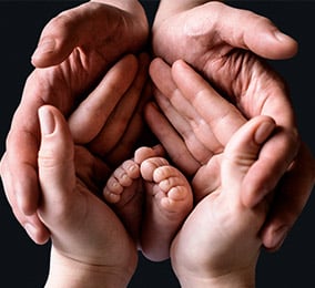 Photo of hands in the shape of a heart